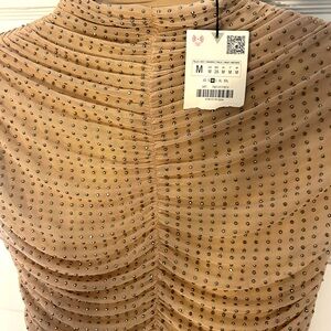 Brand new Zara dress size medium.